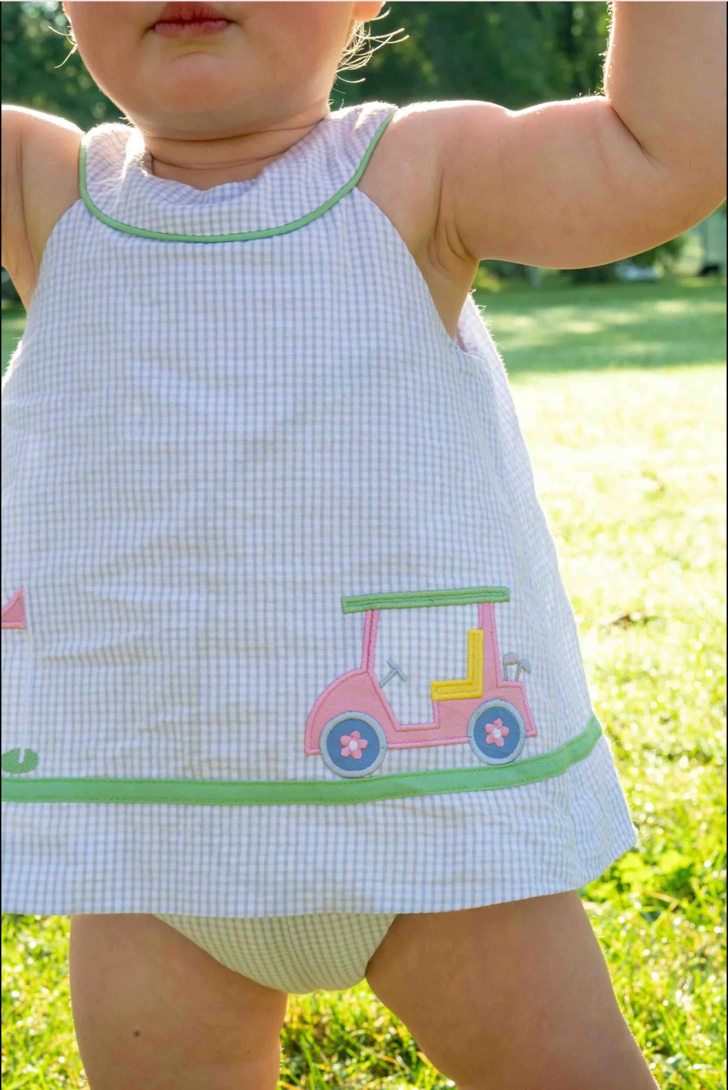 Check Seersucker Skirted Romper with Golf Cart from Anderson Parker