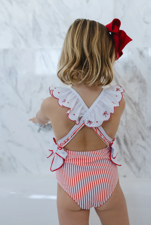 Santa Tell Me Red Bows Swimsuit from Anderson Parker