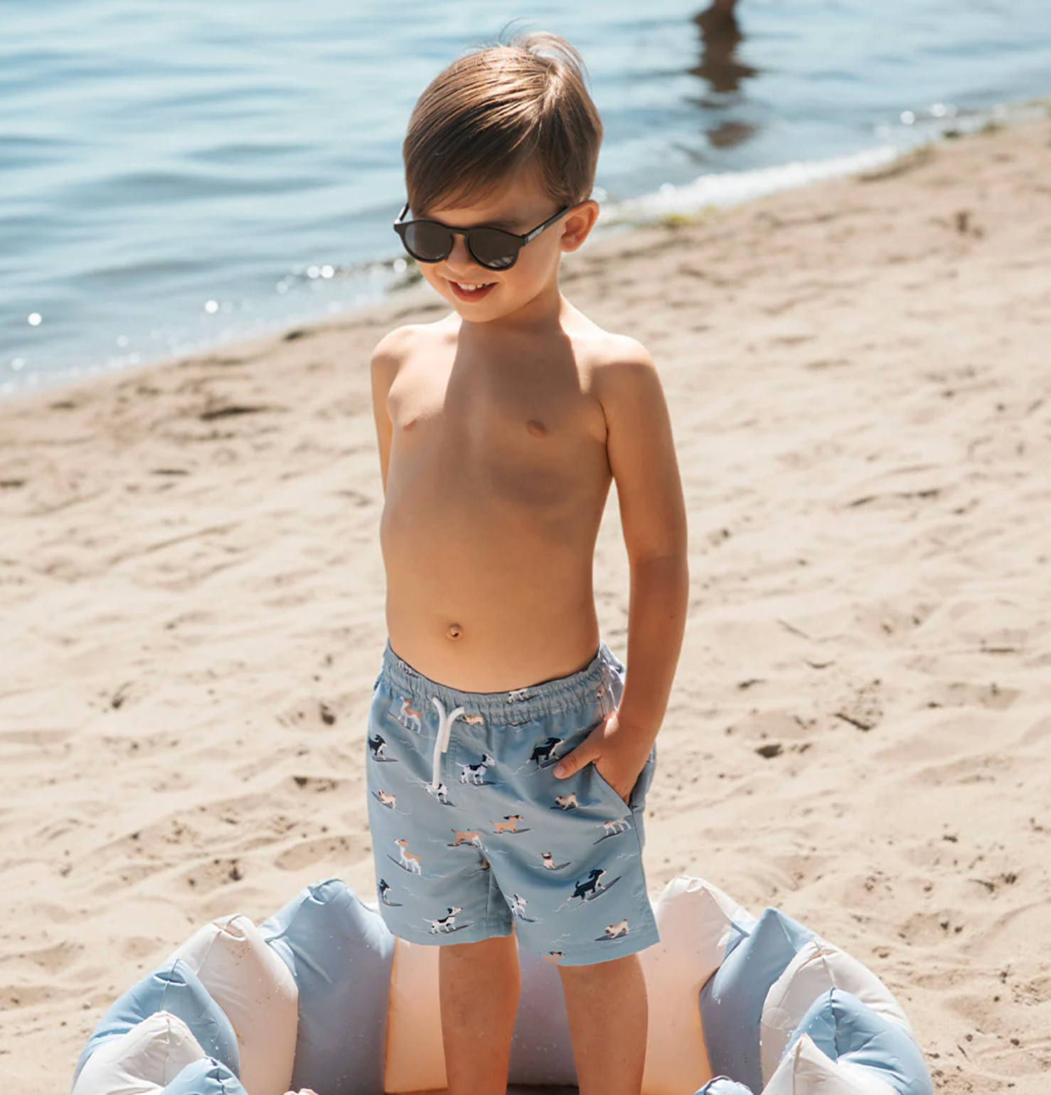 Surfing Pups Print on Blue Swim Trunks from Anderson Parker