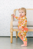 Fall Flowers Ruffle Romper from Anderson Parker