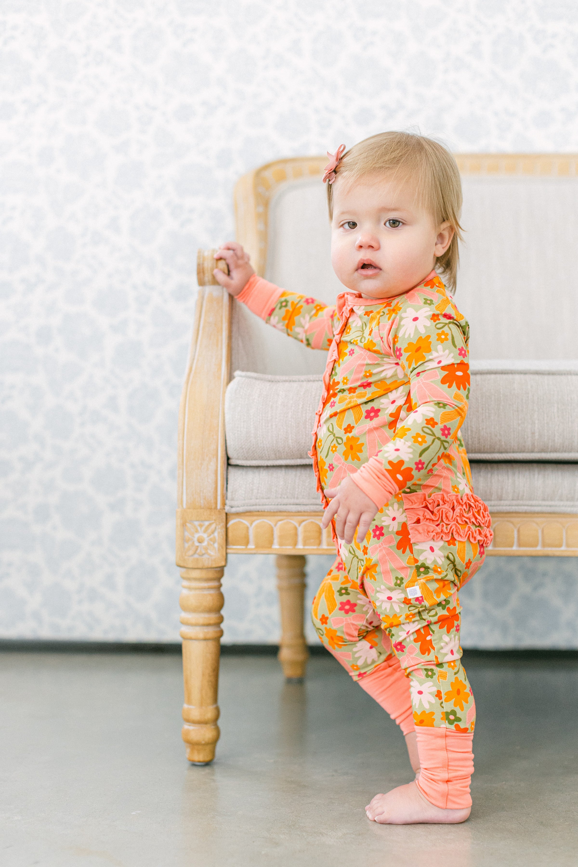 Fall Flowers Ruffle Romper from Anderson Parker