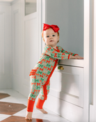 Christmas Bows Premium Ruffle Romper from Anderson Parker