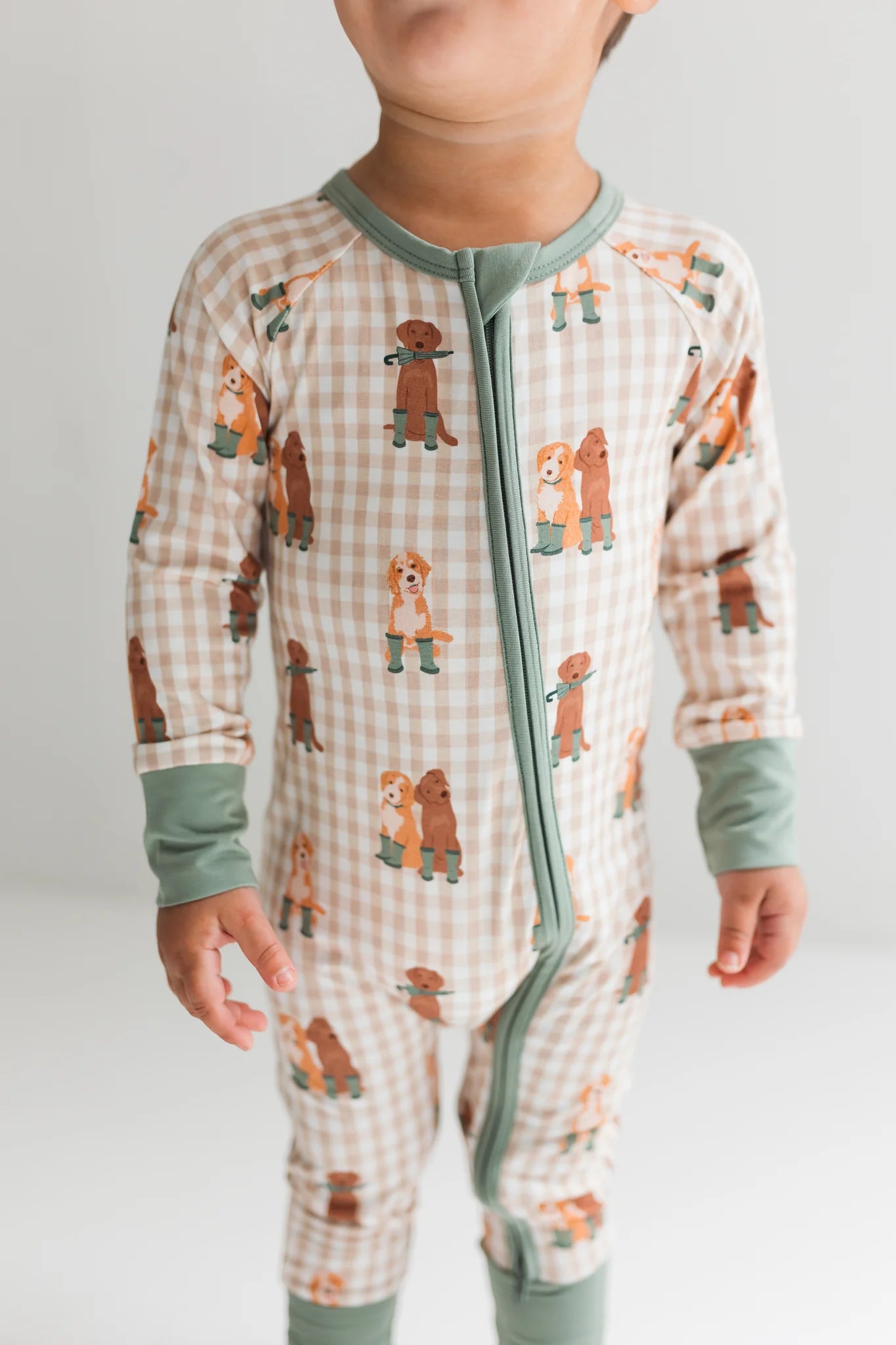 Green Pup Friends Zipper Romper from Anderson Parker