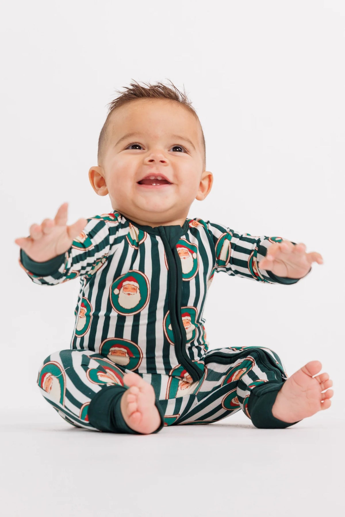 Green Santa Claus Lane Zipper Romper from Anderson Parker