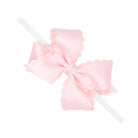POWDER PINK - Small Grosgrain Hair Bow with Embossed Eyelet Edge on White Nylon Band from Anderson Parker