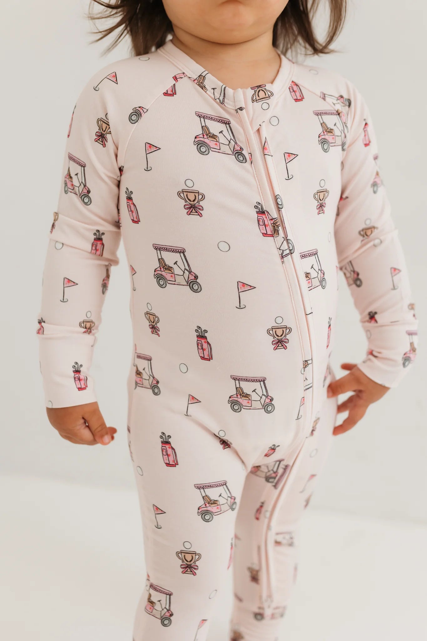 Pink Golf Zipper Romper from Anderson Parker