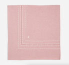 Pink knit blanket with topstitching from Anderson Parker