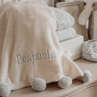 Pom Pom Trim Fleece Baby Stroller Blanket from Anderson Parker