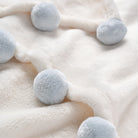 Pom Pom Trim Fleece Baby Stroller Blanket from Anderson Parker