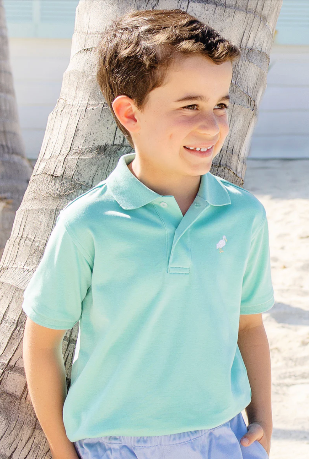Prim & Proper Polo - Turks Teal with Multicolor Stork from Anderson Parker