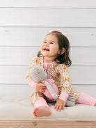 Pumpkin Darling Ruffle Romper from Anderson Parker