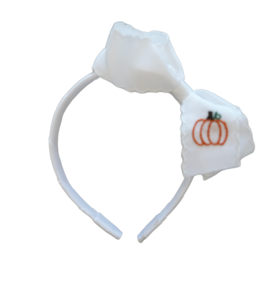 Medium White Headband with an Orange Pumpkin from Anderson Parker