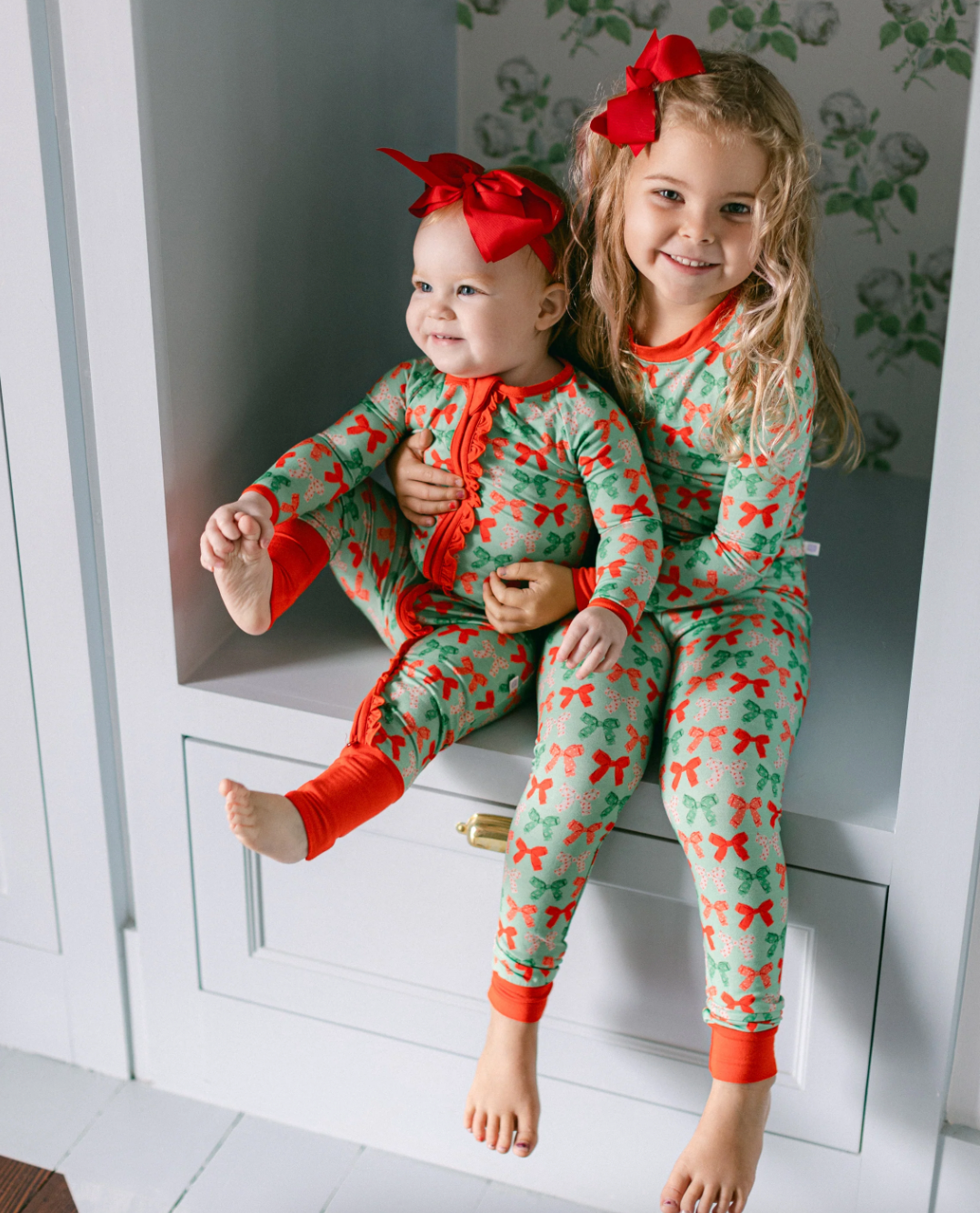 Christmas Bows Premium Ruffle Romper from Anderson Parker