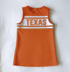 THE UNIVERSITY OF TEXAS BURNT ORANGE STRIPED CHEER DRESS from Anderson Parker