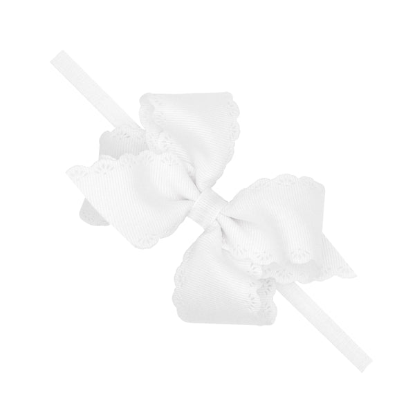 White - Small Grosgrain Hair Bow with Embossed Eyelet Edge on White Nylon Band from Anderson Parker